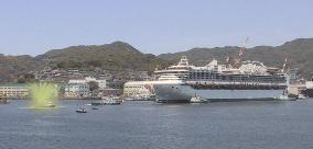 Diamond Princess cruise ship welcomed by water spray